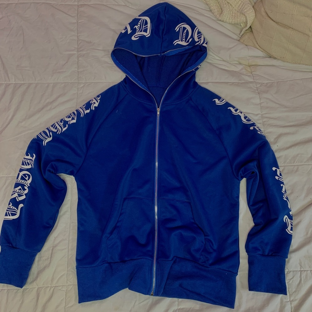 Women’s blue zip up graphics sweatshirt